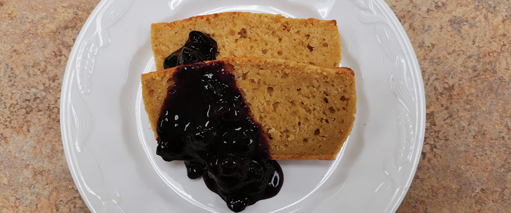Lemon loaf with berry coulis