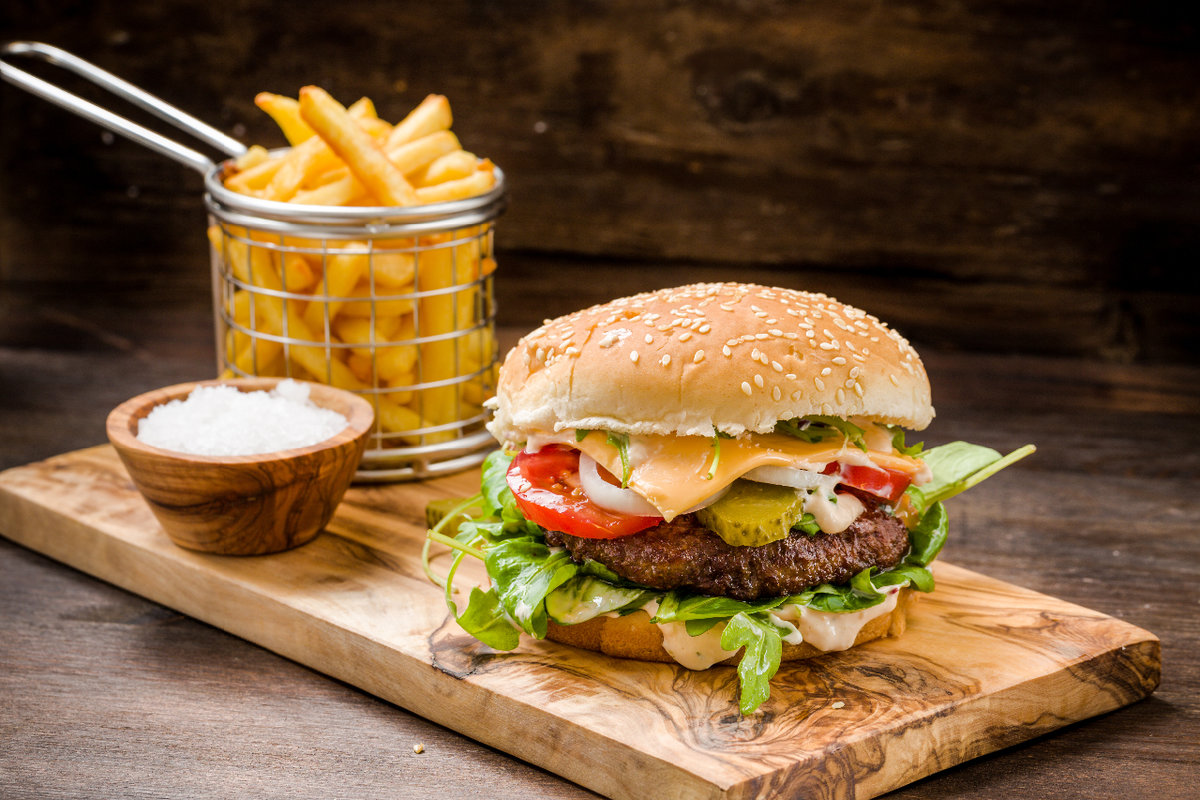 Cooked hamburger with fries