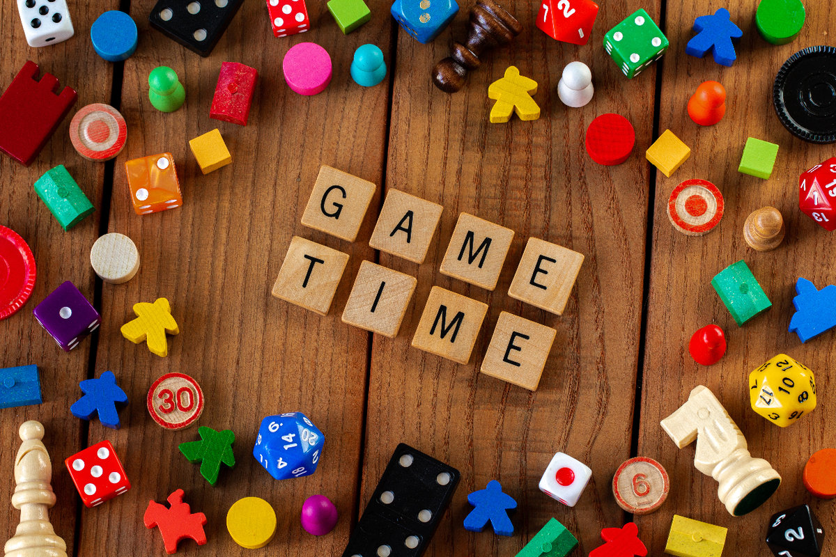 Game time with playing pieces, dice and more
