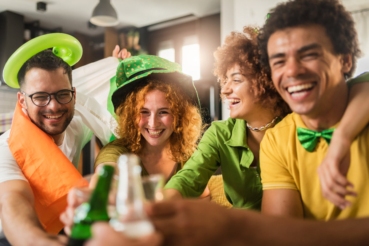 Young people having fun celebrating St. Patrick's Day