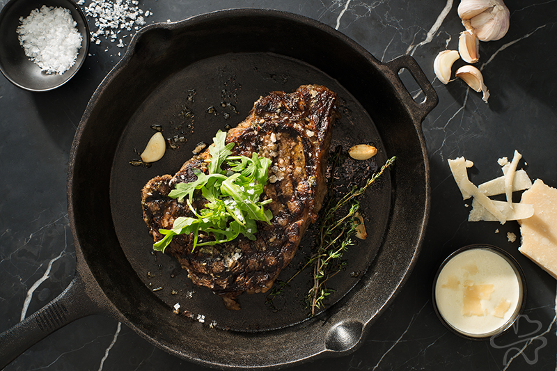 Ribeye with Parmesan Cream Sauce and Arugula